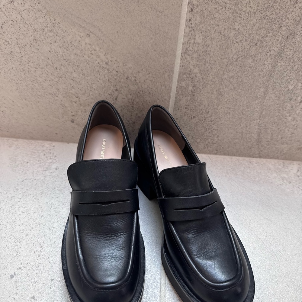 Stuart Weitzman Classic Black Leather Slip-Ons